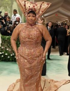Lizzo Calls Critics “Fatphobic” As They Compared Her Met Gala Outfit To Various Objects